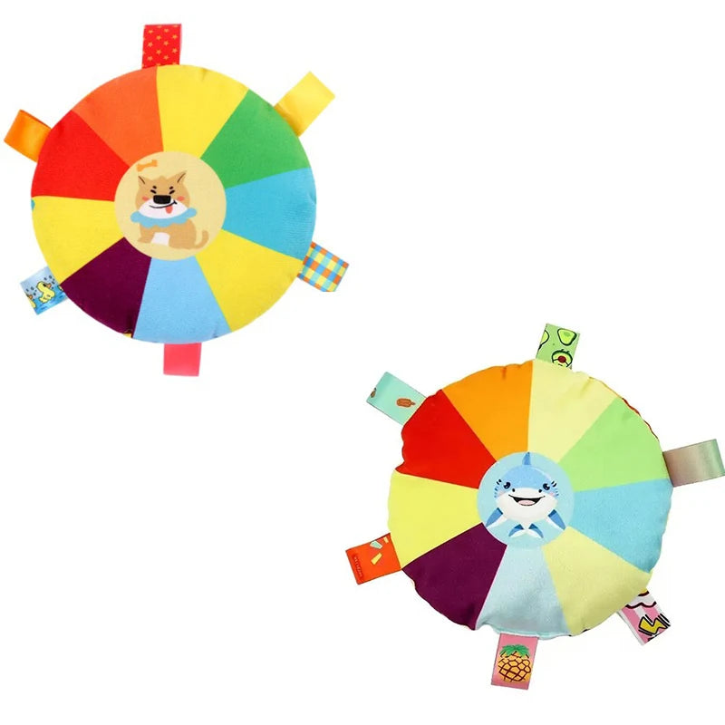Petivo SqueakDisc™ cartoon plush dog toy in vibrant colors, featuring a bell sound for playful chewing and fetching.