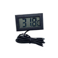 High-accuracy Aqua-Check Elite electronic water monitor with probe and suction cup for fish tank temperature measurement.