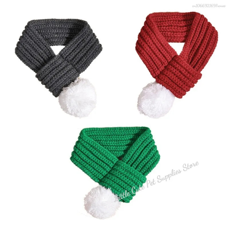 Red knitted pompom scarf for dogs and cats, providing cozy warmth and comfort for pets during chilly weather.