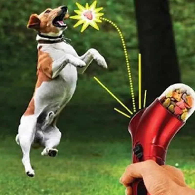 FetchFire™ Portable Treat Shooter by Petivo, lightweight training gun for pets, showing spring-loaded mechanism and treats.