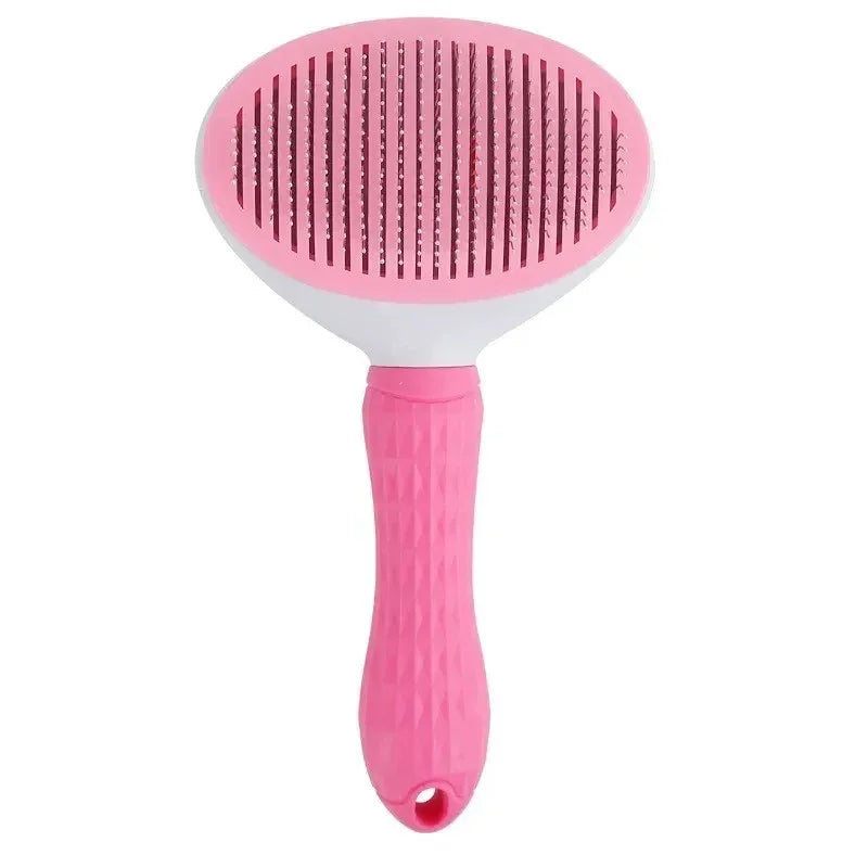 Pink pet grooming brush with soft bristles and ergonomic handle for cats and dogs