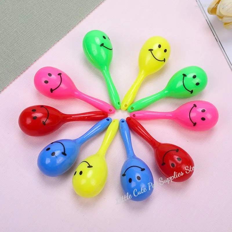 BeakBright™ Parrot Sand Rattle Toys, colorful interactive balls for beak grinding and training for birds.