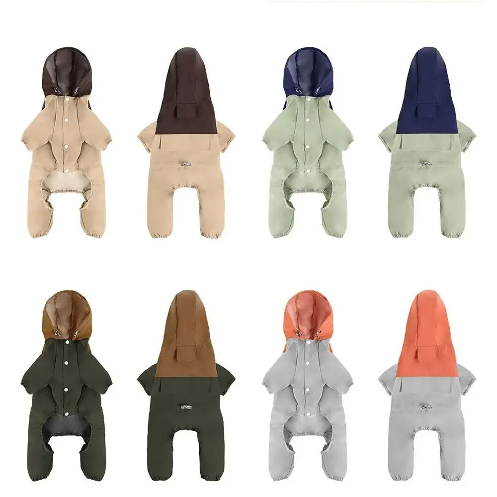Assorted dog raincoats with hoods in multiple colors, displayed flat on white background.