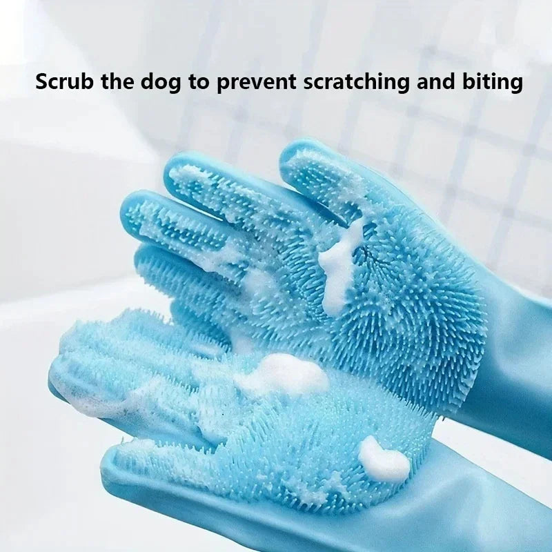 Blue silicone pet grooming gloves with soft bristles and soap suds for dog bathing