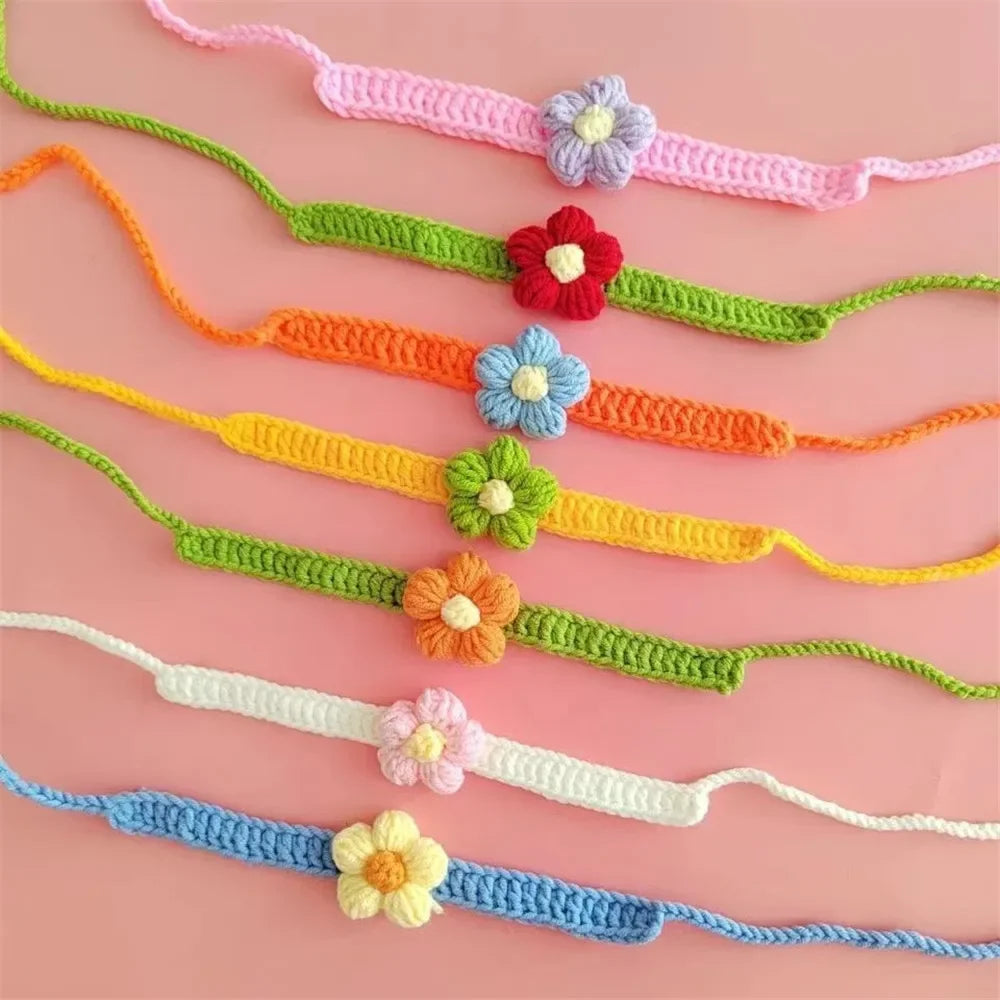 PetalPals™ crochet bowtie necklace featuring a soft knitted flower charm, lightweight and adjustable for pets.