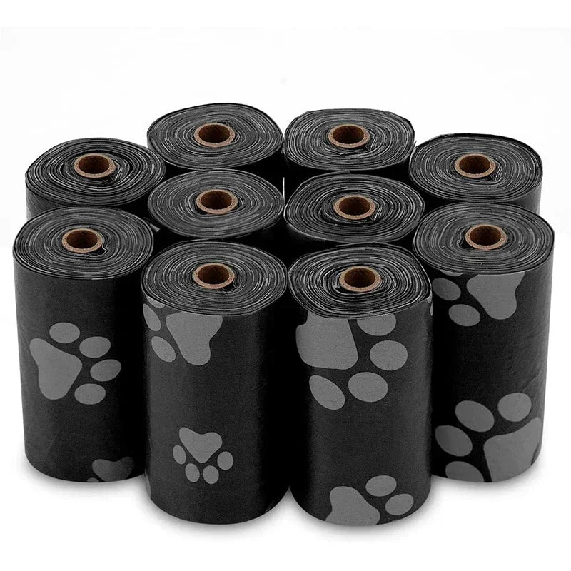 Black pet waste bag rolls with paw print design, ideal for dog poop cleanup
