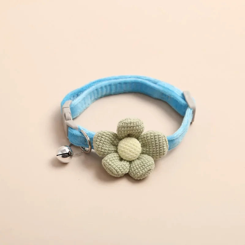 SoftHaven adjustable pet collar with a bowknot, bell, and breakaway design for dogs, made of soft cotton.
