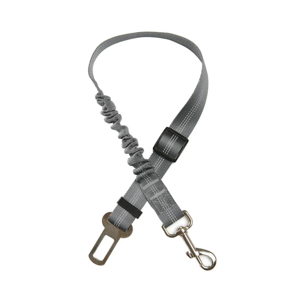 Adjustable SafePaws™ dog car seat belt in reflective elastic, designed for safe travel with pets.