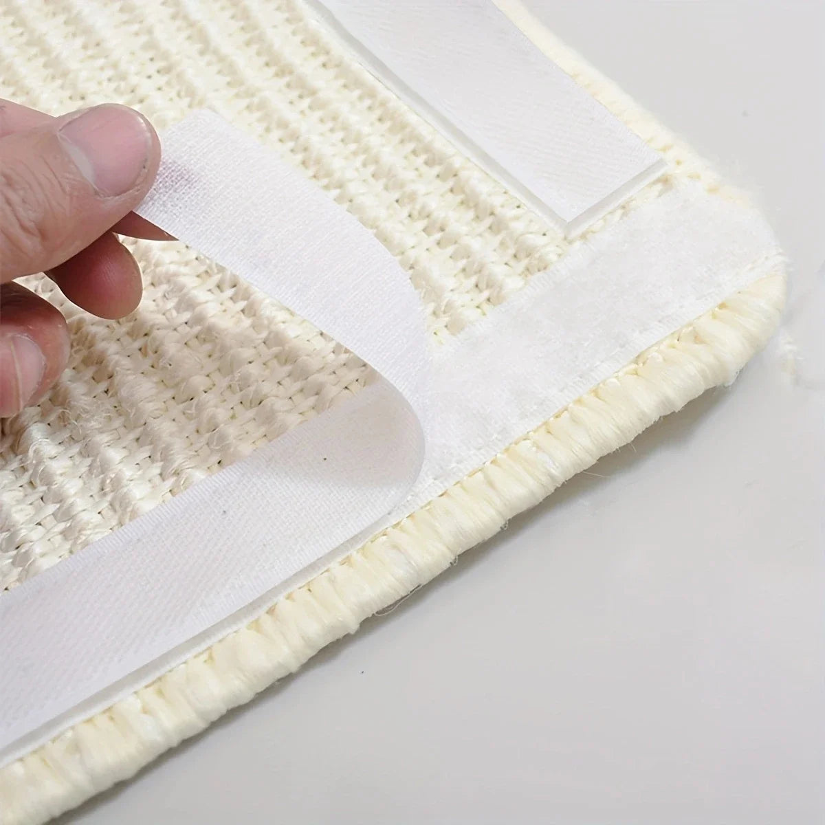 PurrGuard™ Sisal Cat Scratching Mat in natural fibers, designed to protect furniture and care for claws.
