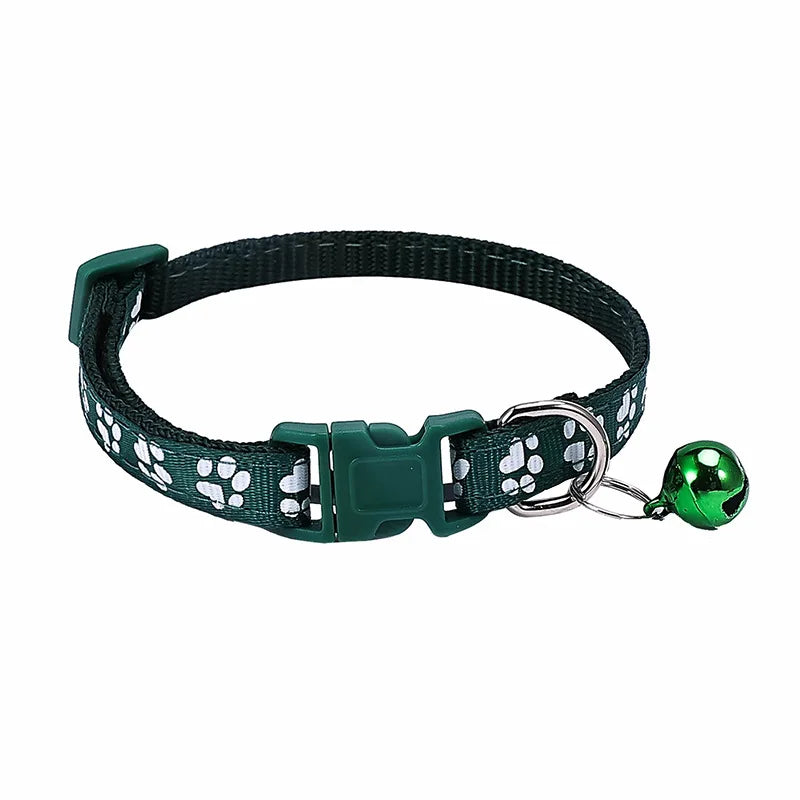 Colorful PawGuard™ pet collar with bell, featuring cartoon footprints, adjustable design for dogs and cats.