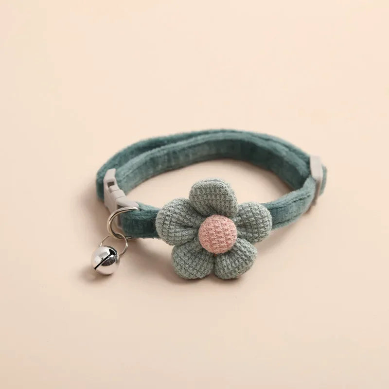 Adjustable SoftHaven™ pet collar with a bowknot design and bell for dogs, made from soft cotton fabric.