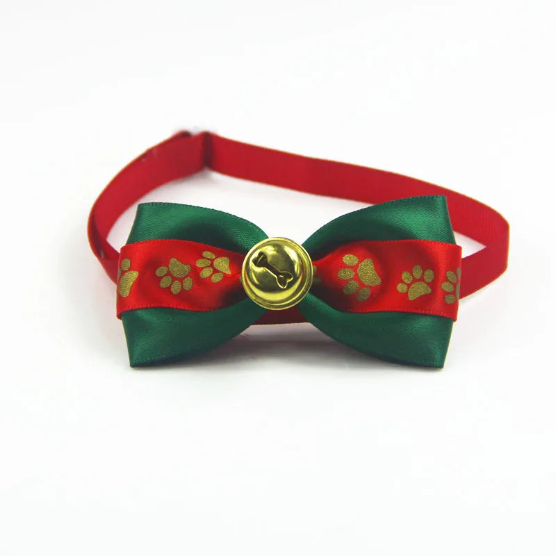 Adjustable SnuggleNest™ Christmas bow tie collar for dogs and cats, featuring festive holiday design and vibrant colors.