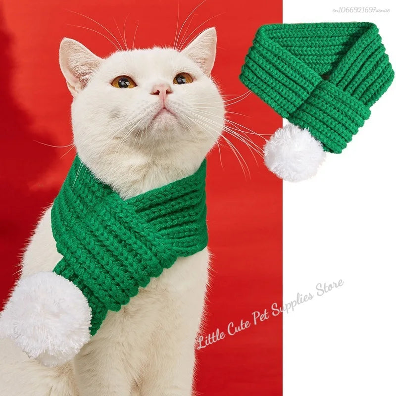 Red knitted scarf with pompom, designed for dogs and cats, offering cozy warmth and comfort for pets.