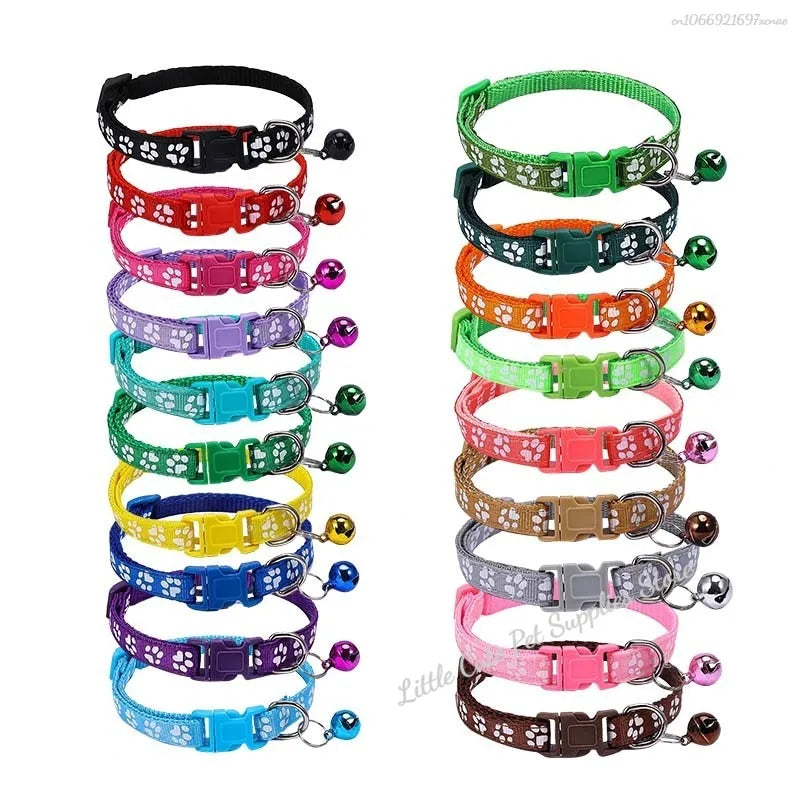 Colorful PawGuard™ pet collar with bell featuring cartoon footprints, adjustable for dogs and cats.