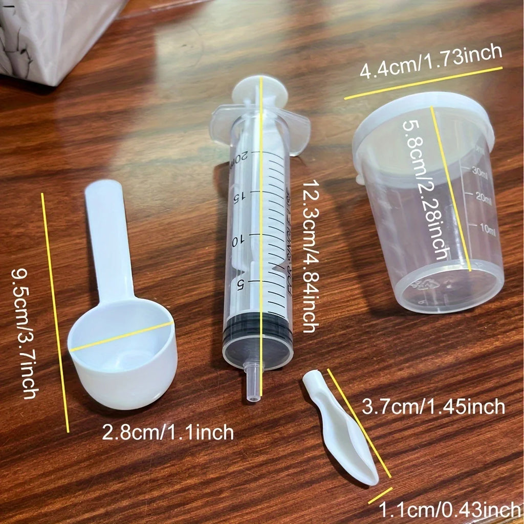 4-piece precision syringe set for hand-rearing baby birds by Petivo, featuring syringes of various sizes and designs.