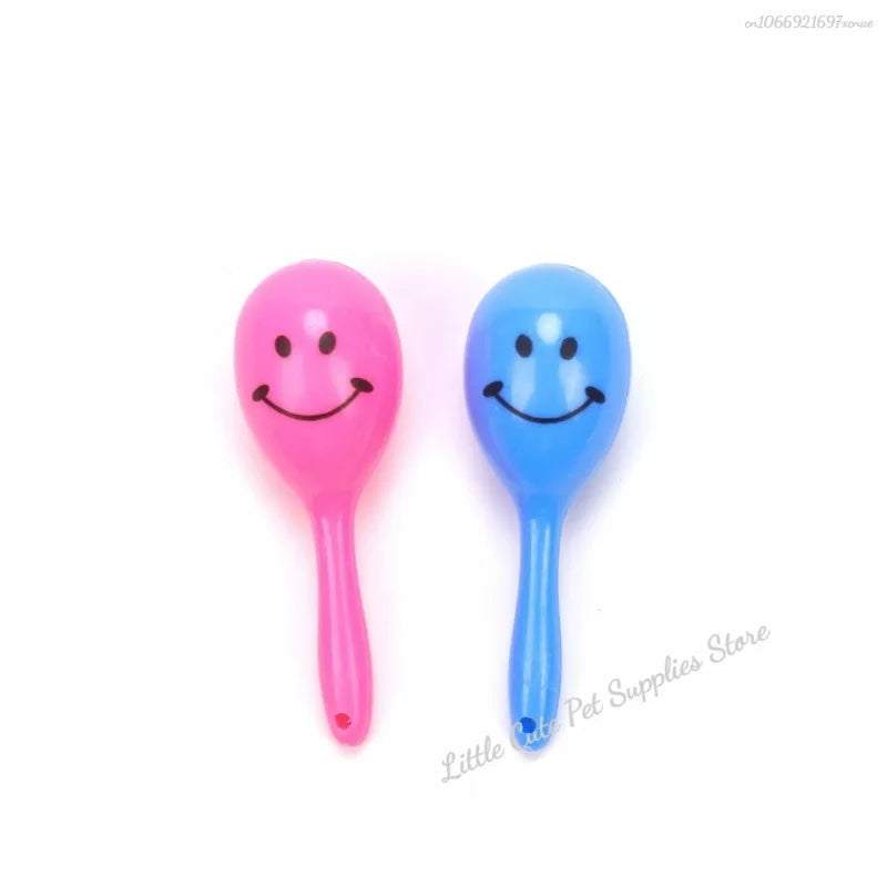 BeakBright™ parrot sand rattle toys in various colors, ideal for beak grinding and training for birds.