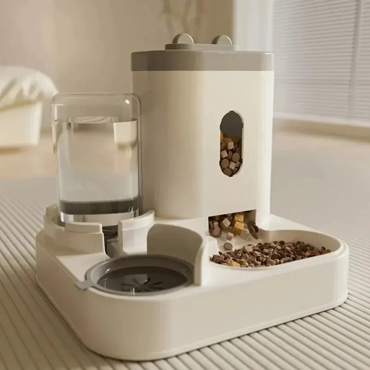 EverFresh™ Gravity-Flow Diner with self-refilling water dispenser and feeding basin for mess-free pet dining.