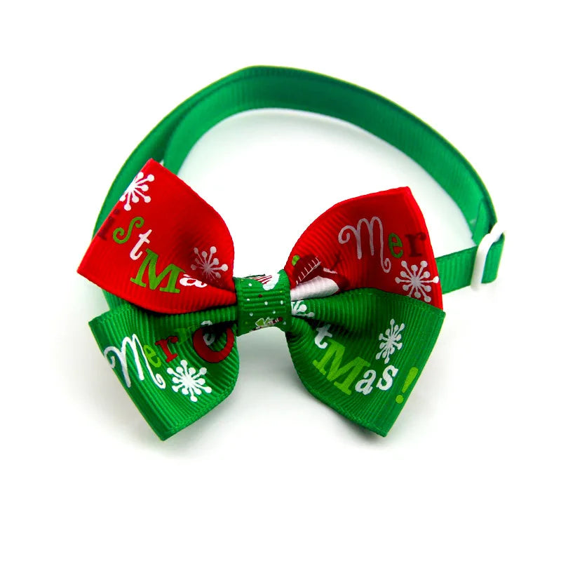 Adjustable SnuggleNest™ Christmas bow tie collar for dogs and cats, featuring festive red and green design.