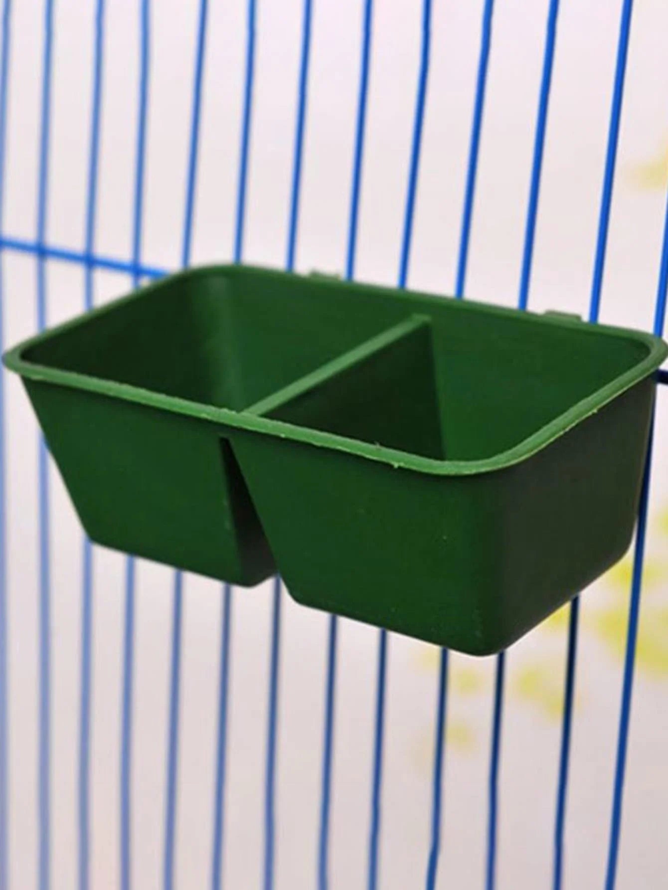DuoFeed™ 2-in-1 hanging bird feeder with integrated food and water dispensers for bird cages, featuring double compartments.