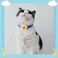 PetalPals™ crochet bowtie necklace featuring a soft knitted flower charm in an adjustable design.