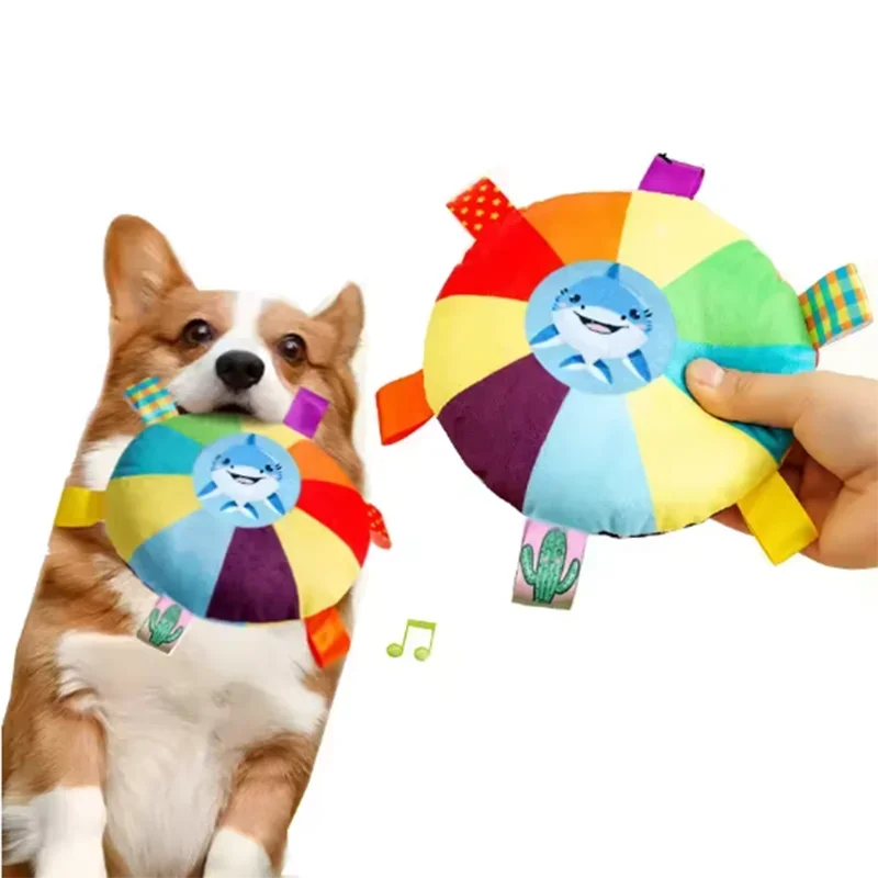 SqueakDisc™ cartoon plush dog toy with bell sound, designed for chewing and playful fun for dogs.