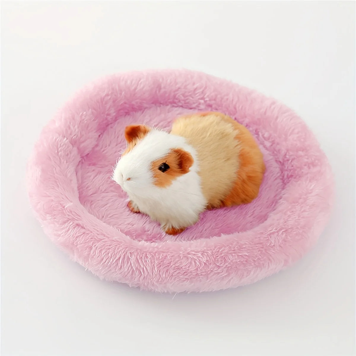 SnuggleNest™ solid color plush pet bed, featuring a warm and comfortable indoor mat for pets to relax on.