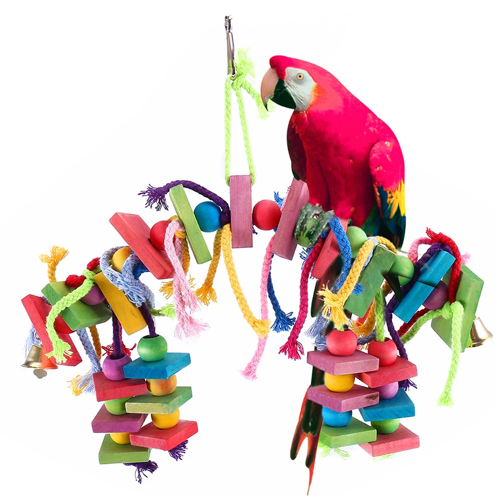 VitaBlock™ wooden beak conditioner and chew toy with bell for parakeets and small birds, featuring a playful design.