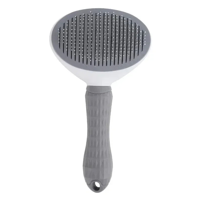 Gray pet grooming brush with ergonomic handle for cat and dog hair detangling